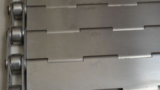 Metall-Edelstahl-Lamellenkettenglied-Metallplatten-Chip-Förderband für Keksofen-Bäckerei Anneali